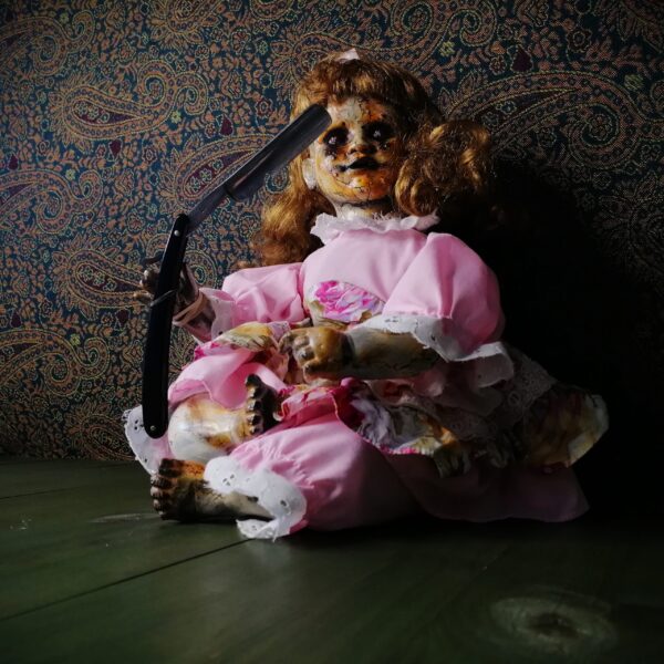 Scary Doll Razor Girl